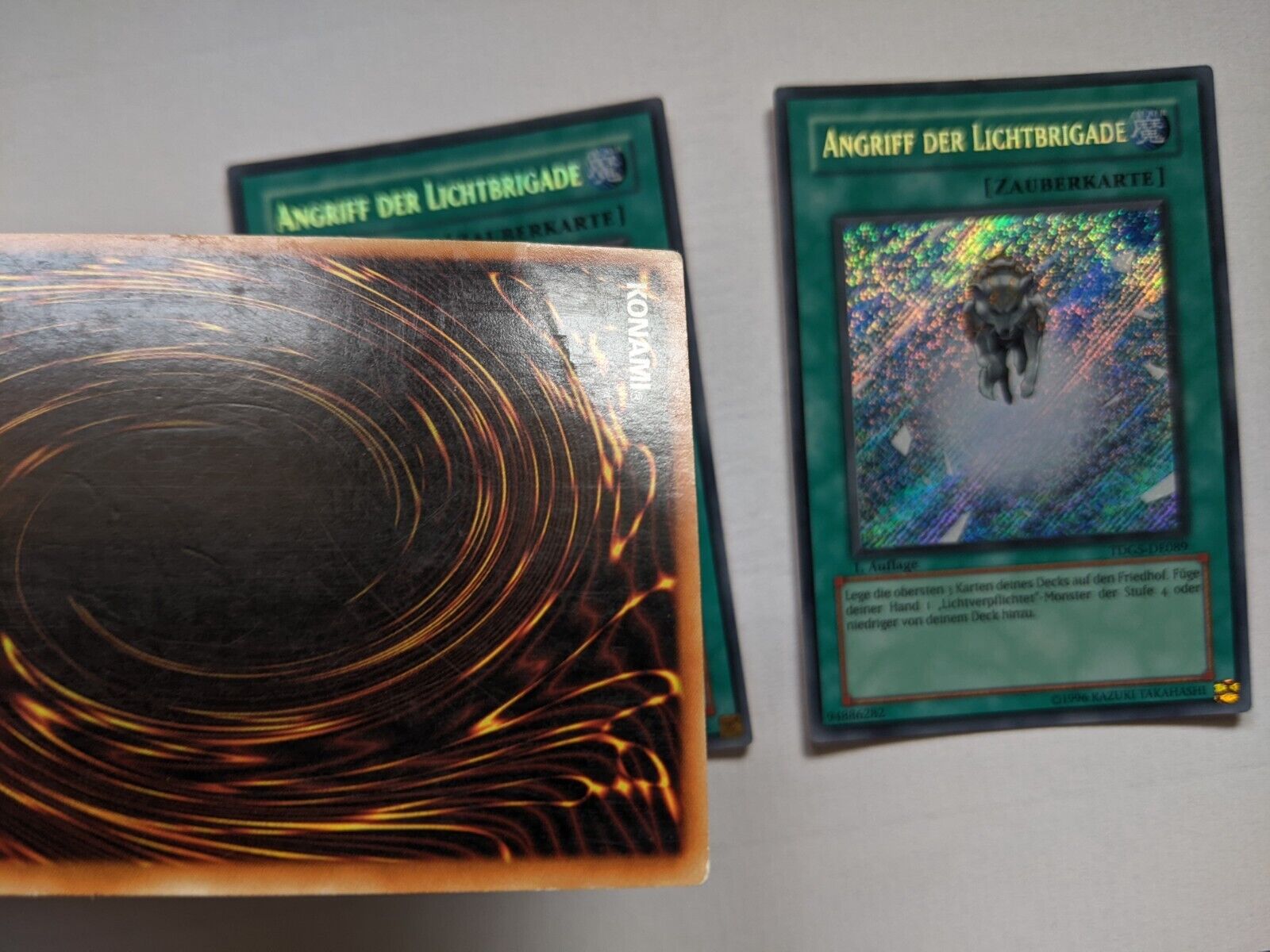 Pickering Framework Aftensmad Yugioh! 3x Charge of the Light Brigade TDGS-EN089 GERMAN Secret Rare 1st  Ed. | Mox Beta